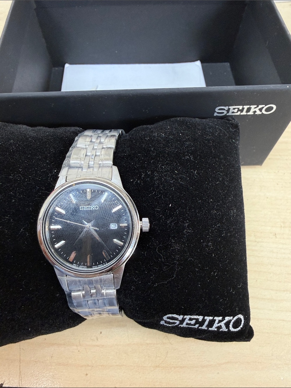 Seiko Silver Watch with Black Sunburst Dial